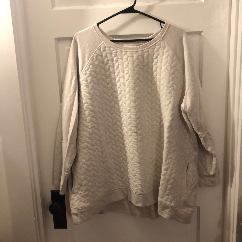 Oatmeal colored sweater with stitched pattern